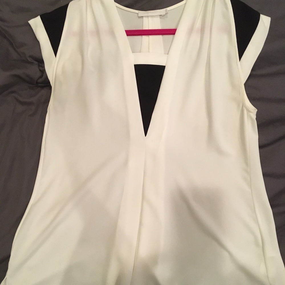 Softly flowing black and white blouse